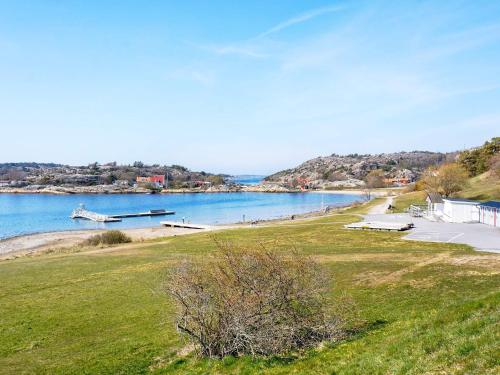 a view of a body of water with a beach at Apartment in center of Strömstad in Strömstad