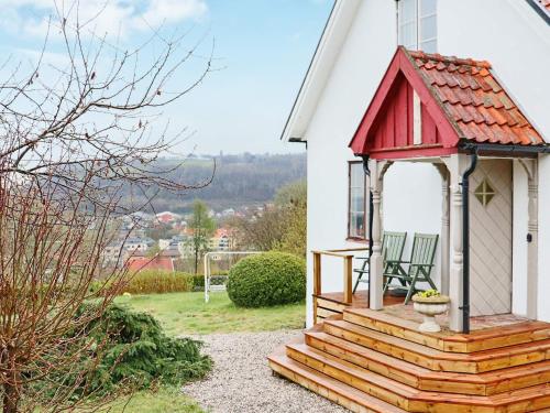 a small gazebo on the side of a house at 5 person holiday home in BÅSTAD in Båstad