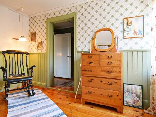 4 person holiday home in KARLSBORGにあるベッド