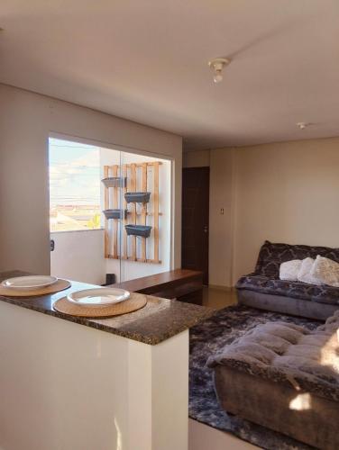 Χώρος καθιστικού στο Apartamento temporada PNZ