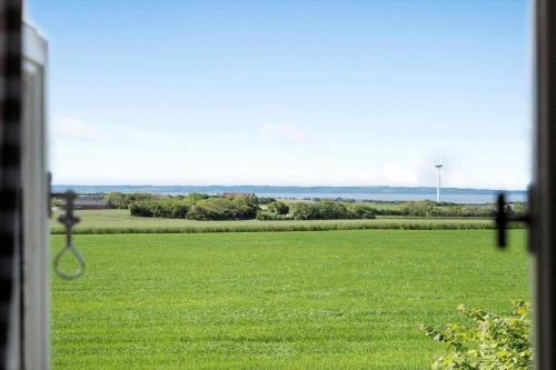 a view of a green field from a window at LF10304-Hurup-Thy-Gundtoft-Mollevej-4 in Gettrup