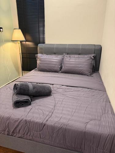 Katil atau katil-katil dalam bilik di Ariyanie Roomstay 1
