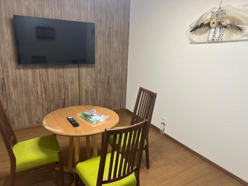 TV a/nebo společenská místnost v ubytování ゲストハウスまみむ