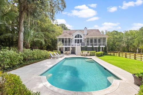 a swimming pool in the yard of a house at Boview Hall- Poo l Hot Tub-15 mins to Kiawah in Johns Island