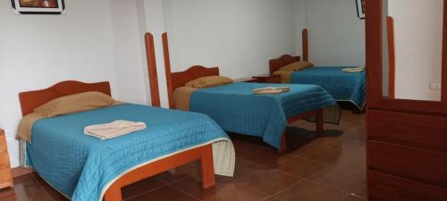 Ένα ή περισσότερα κρεβάτια σε δωμάτιο στο Casa Tejedora