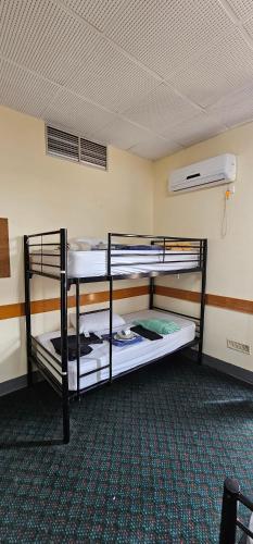 Postel nebo postele na pokoji v ubytování CrewHouse