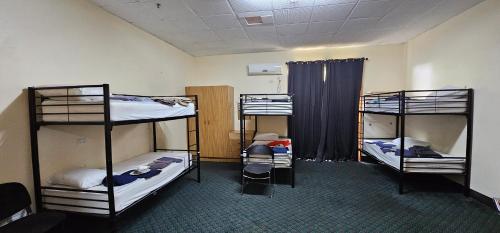 Postel nebo postele na pokoji v ubytování CrewHouse