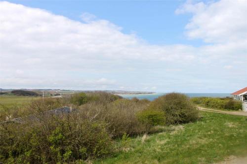 a view of the ocean from the top of a hill at LF11932-Struer-Gl-Landevej-23 in Struer