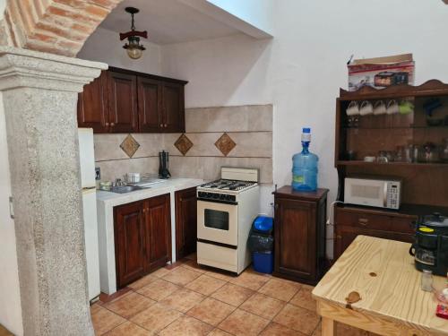 Η κουζίνα ή μικρή κουζίνα στο Charming Colonial Villa Azotea