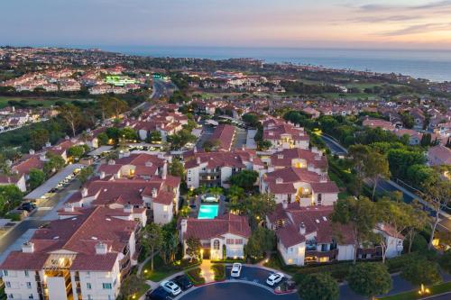 an aerial view of a residential neighborhood with houses at Coastal Retreat w Pool Spa BBQ Near Beaches Golf Courses Ritz Pointe Condo by AvantStay in Dana Point
