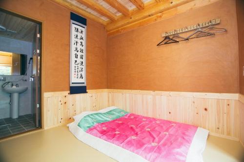 Postel nebo postele na pokoji v ubytování Laon Hanok Gguljam