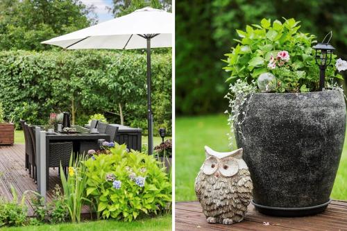 an owl sitting on a table next to a vase with flowers at LF15149-Farso-Ramshule-49 in Farsø