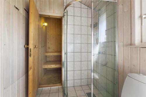a bathroom with a shower and a toilet in it at LF453-Vestervig-Hannesvej-23 in Vestervig