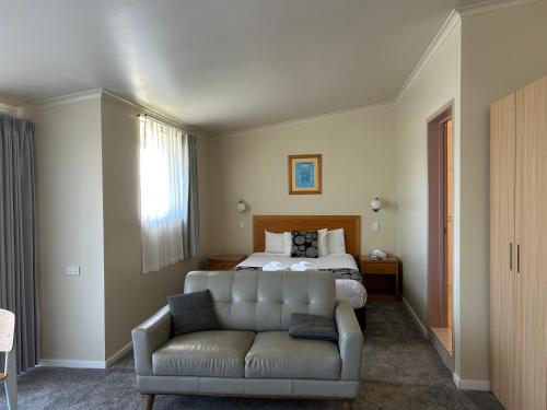Katil atau katil-katil dalam bilik di Toowoomba Motel