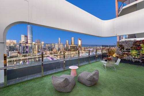 a view of a city skyline from a building at Art House Apartments by CLLIX in Brisbane
