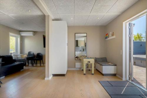 a living room with a couch and a table at LF12086-Vinderup-Vigen-86 in Vinderup