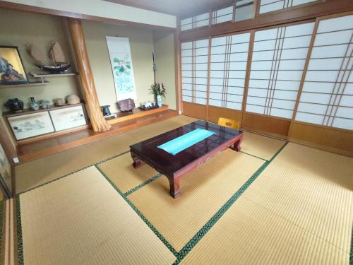 a large room with a pool in the middle of it at Kanupata - Vacation STAY 18611 in Ishigaki Island