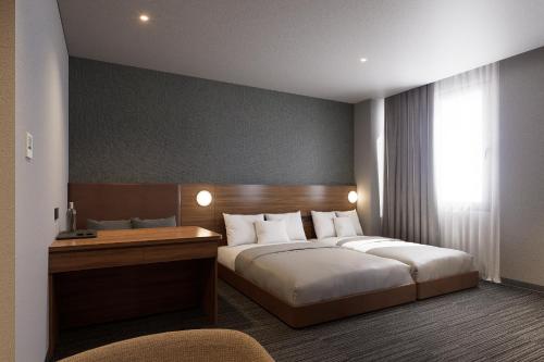 Postel nebo postele na pokoji v ubytování SUPER HOTEL HANOI - Grand Opening in 17 March 2026