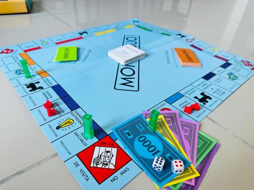 a close up of a monopoly board game at 马六甲 Melaka Amber cove residence Jonker Street in Melaka