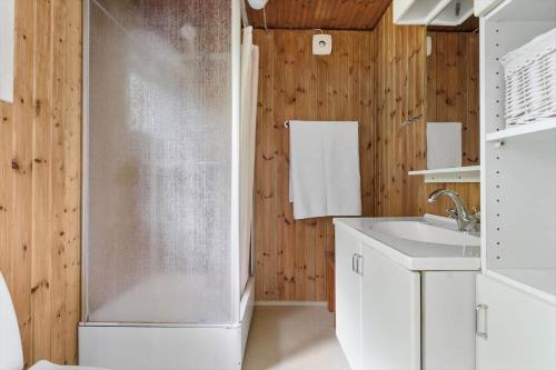 a bathroom with a shower and a sink at 2700-Nexo-Munkegardsskoven-3 in Neksø