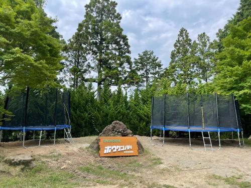 two blue tarps and a box in front of trees at Cate no mori - Vacation STAY 21108v in Shime