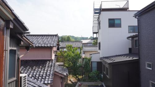 an overhead view of a city with buildings at Higashiyama Komachi in Kanazawa