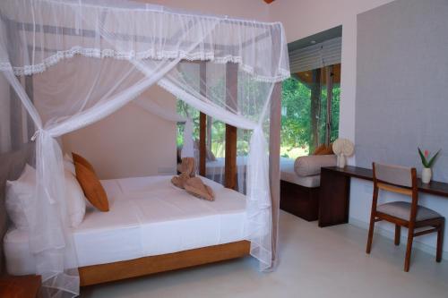 Ένα ή περισσότερα κρεβάτια σε δωμάτιο στο ONA Garden Villa