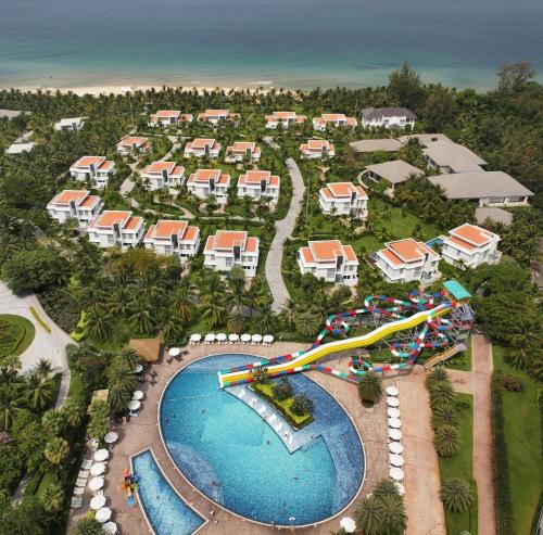 an aerial view of a water park with a water slide at Wyndham Grand Phu Quoc in Phu Quoc
