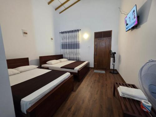 Postel nebo postele na pokoji v ubytování Sasa Green Lodge