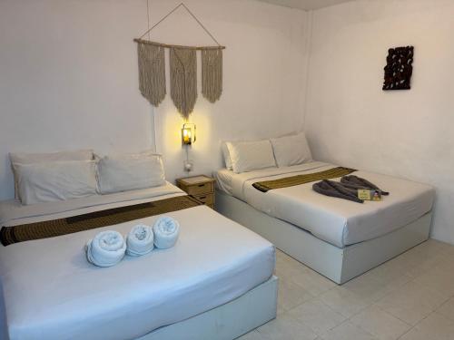 Katil atau katil-katil dalam bilik di Pagi Pagi villas