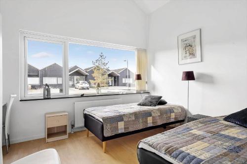 Una cama o camas en una habitación de OH477-Hadsund-Havnen-22