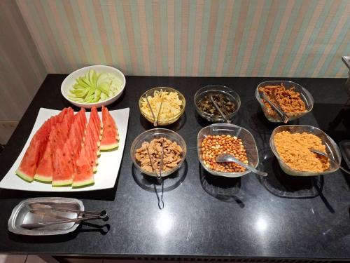 a table with a bunch of different types of food at LA HOTEL- Liuhe Fusing in Kaohsiung
