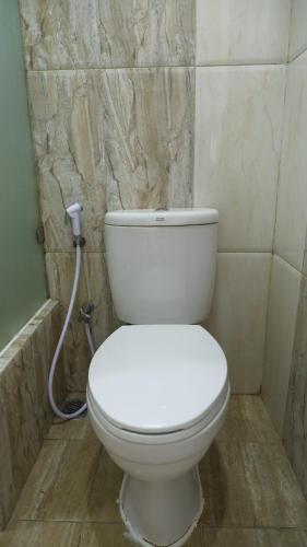 Ein Badezimmer in der Unterkunft Diyar Villas Puncak F4/8