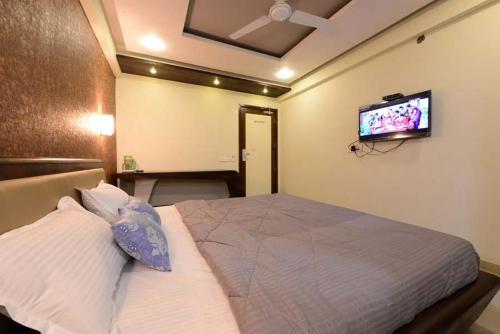 Ein Bett oder Betten in einem Zimmer der Unterkunft Hotel Manila