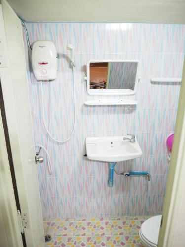 Ванна кімната в Three J Guesthouse