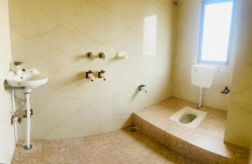 Ένα μπάνιο στο Nandi Homestay