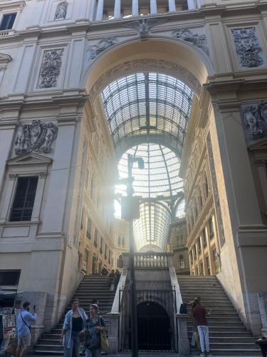 a large building with stairs and a glass ceiling at Casetta Piazza Plebiscito in Naples