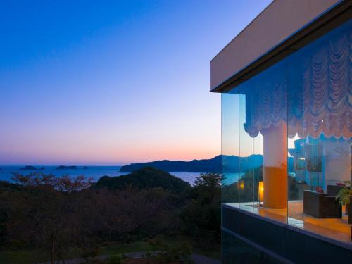 a view of the ocean from a house at Ryoso Uminocho in Ise