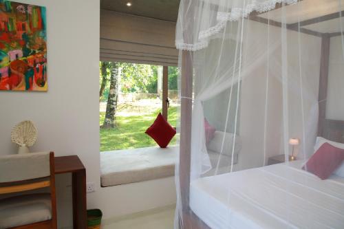Ένα ή περισσότερα κρεβάτια σε δωμάτιο στο ONA Garden Villa