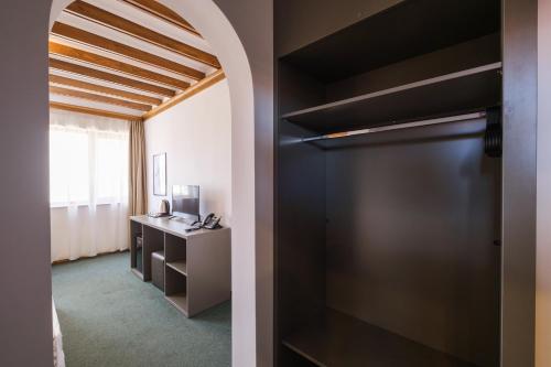 TV a/nebo společenská místnost v ubytování Hotel Razlog