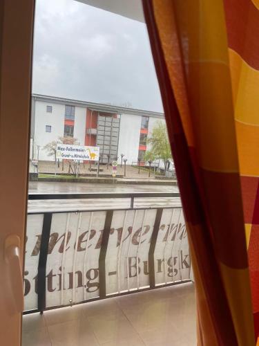 a view of a building from a window at ZV-Scholtz Gästehaus Neuötting Simbacher Straße 7 in Neuötting