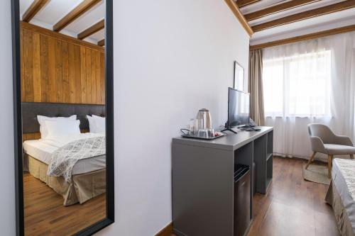 Postel nebo postele na pokoji v ubytování Hotel Razlog