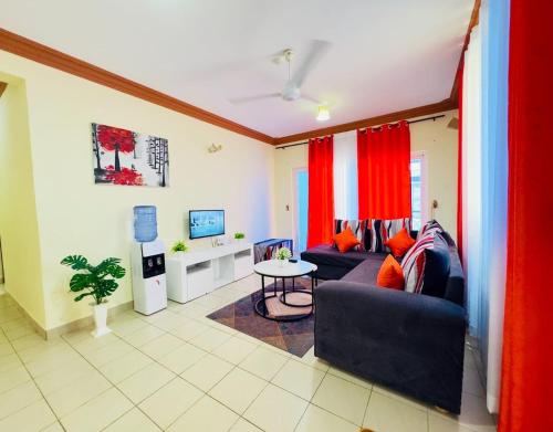 Μια τηλεόραση ή/και κέντρο ψυχαγωγίας στο 1 bedroom blessed apartments