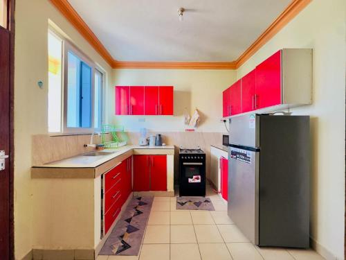 Η κουζίνα ή μικρή κουζίνα στο 1 bedroom blessed apartments