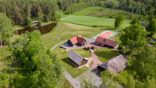 an aerial view of a house in a field at Lättemaa in Raanitsa