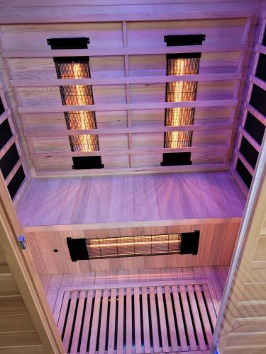 a view from the top of a ceiling with lights at Carpe Diem Wellness Ferienwohnung in Illingen