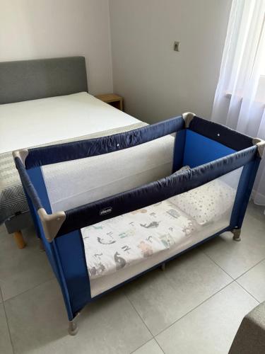 Katil atau katil-katil dalam bilik di Energylandia Zator noclegi apartament pokoje do wynajęcia