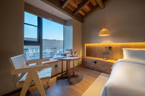 YUANLI HOTELにあるベッド