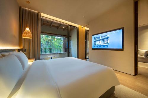 YUANLI HOTELにあるベッド