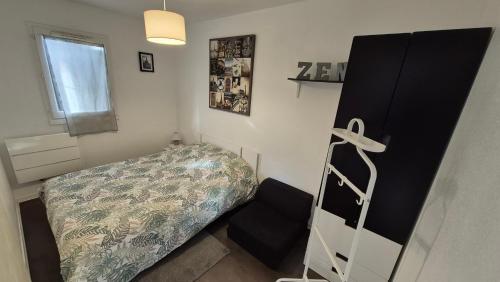 Postel nebo postele na pokoji v ubytování Résidence Front de mer Cabourg - Accès direct plage